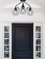 Odyssey Three Light Semi-Flush Mount in Matte Black with 5.75" Clear Bubble Shade