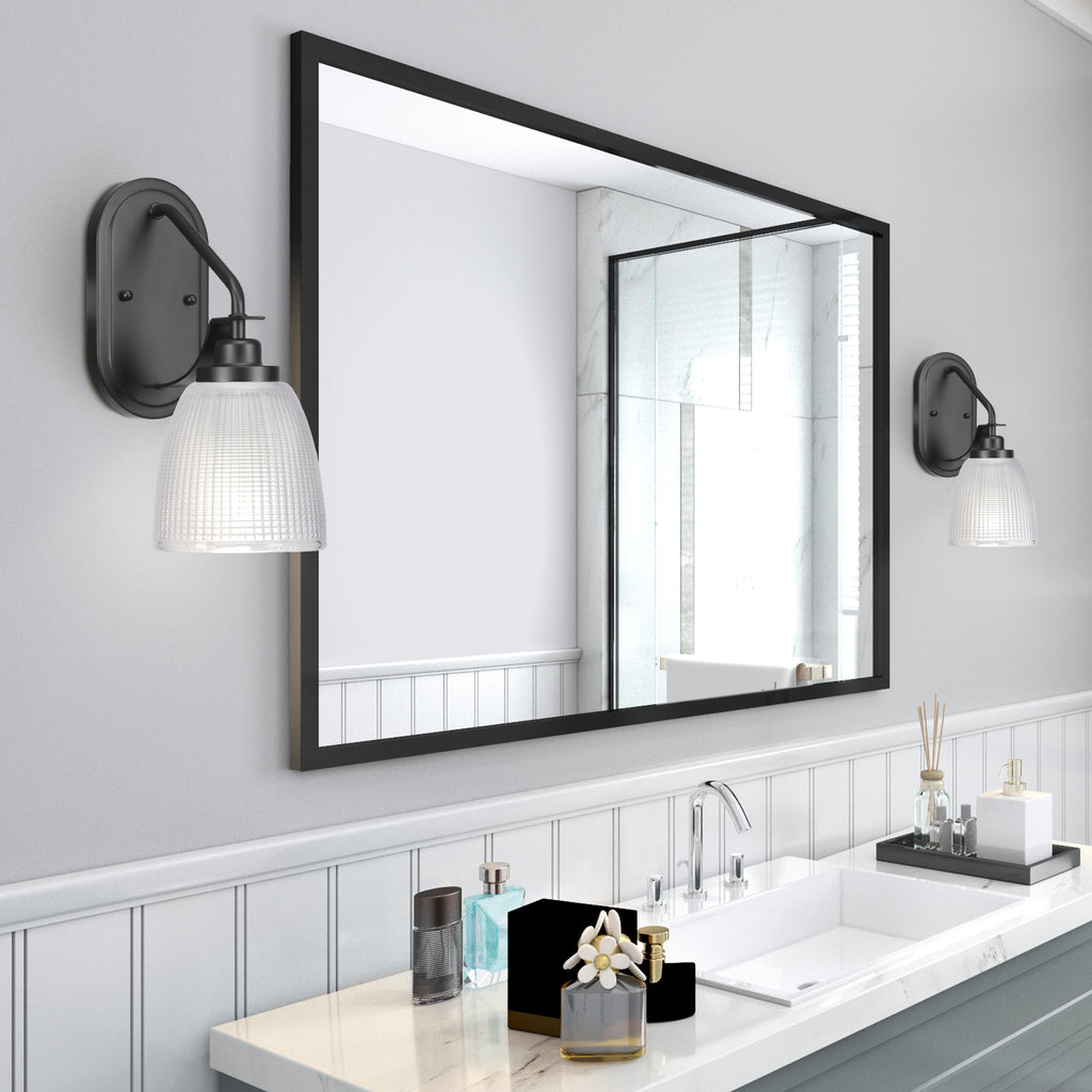 Odyssey One Light Wall Sconce in Matte Black with 5" Clear Ribbed Shade