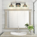 Odyssey Three Light Bath Bar in Matte Black with 7" Kaleidoscope Art Glass Shade