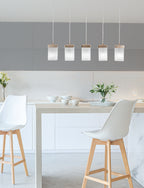 Nouvelle Five Light Linear Pendalier in New Age Brass with 4" Square White Muslin Shade