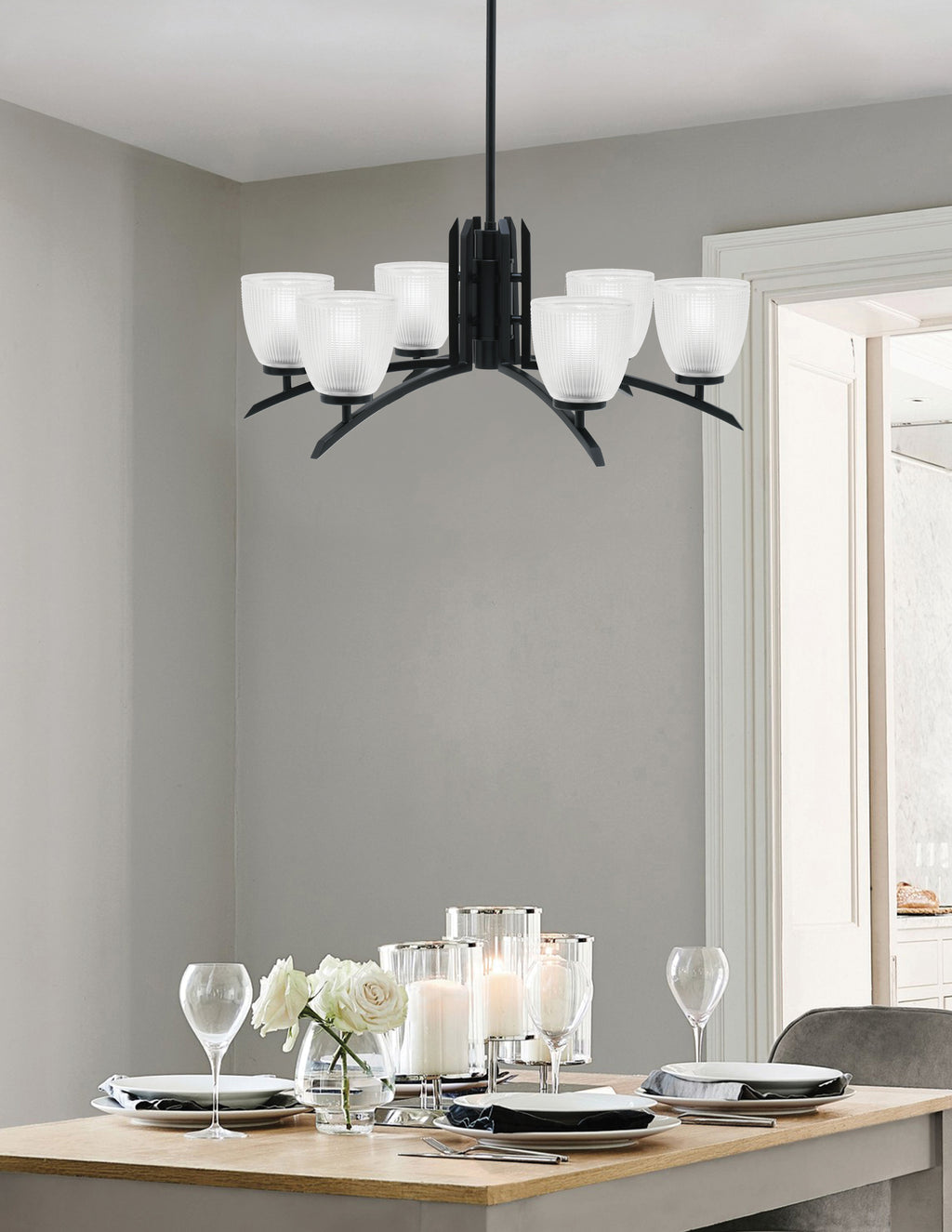 Kurve Six Light Chandelier in Matte Black with Clear Ribbed Shade