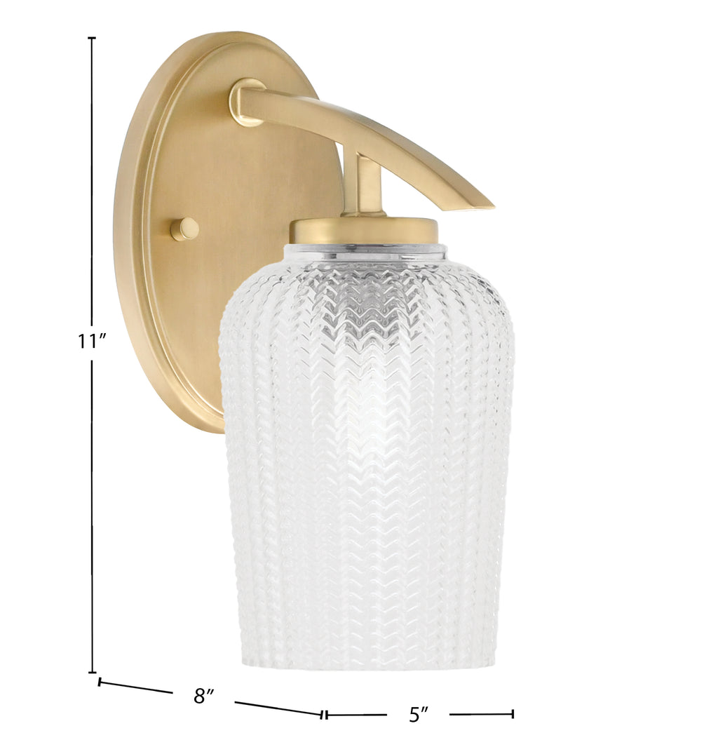 Kurve One Light Wall Sconce in New Age Brass with Clear Textured Glass Shade
