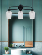 Cavella Three Light Bath Bar in Matte Black with 5" Clear Textured Shade