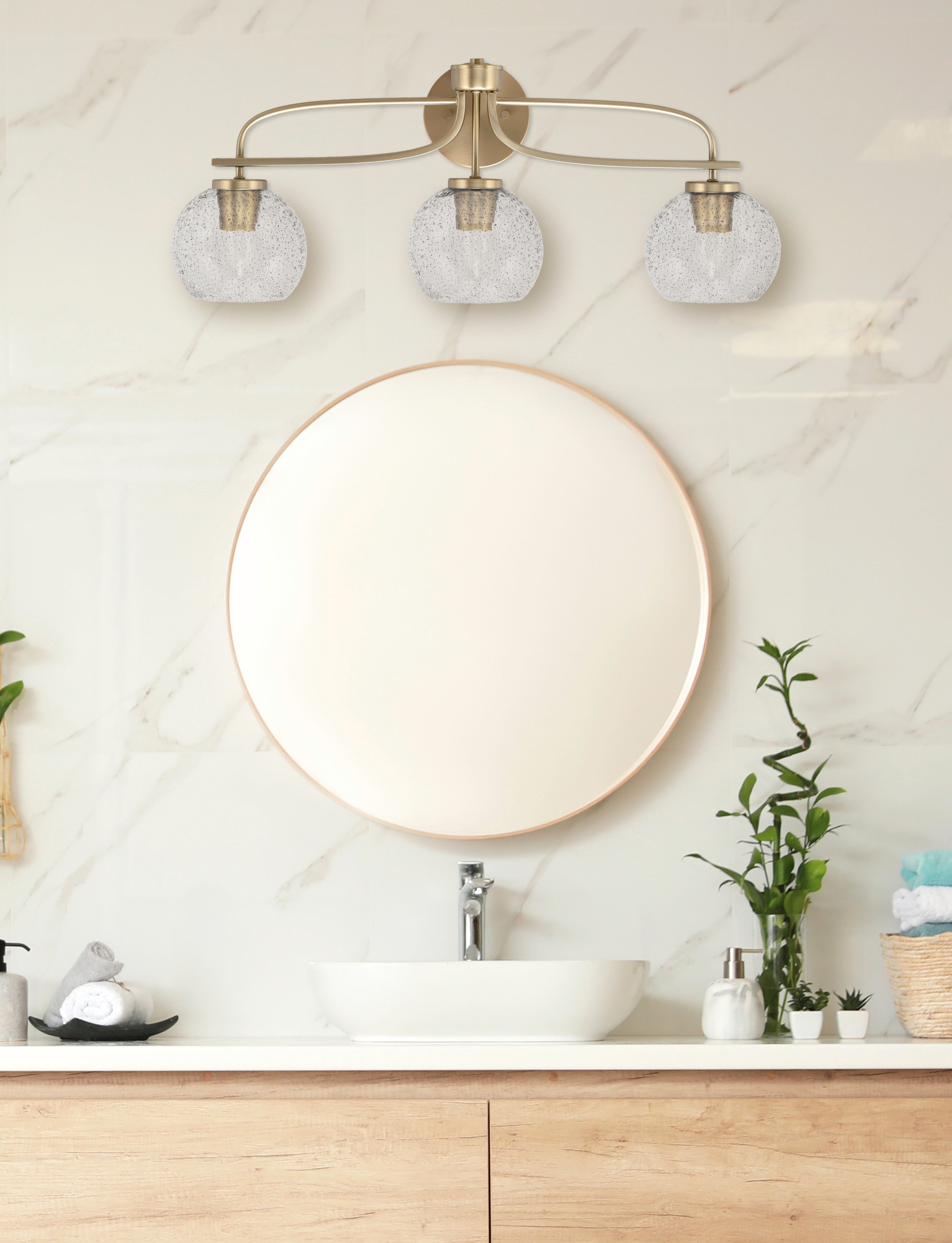 Cavella Three Light Bath Bar in New Age Brass with 5.75" Smoke Bubble Shade