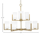Atlas Nine Light Chandelier in New Age Brass with 4" White Muslin Shade