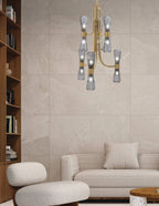 Everleigh 12 Light Chandelier in New Age Brass with Smoke Ribbed Shade