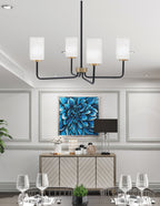 Sandia Four Light Chandelier in Matte Black & New Age Brass with White Marble Shade