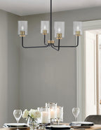 Sandia Four Light Chandelier in Matte Black & New Age Brass with Smoke Bubble Shade