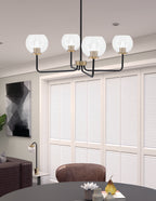 Sandia Four Light Chandelier in Matte Black & New Age Brass with Clear Bubble Shade