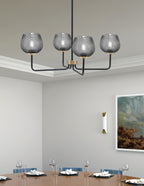 Sandia Four Light Chandelier in Matte Black & New Age Brass with Smoke Textured Shade