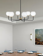Sandia Six Light Chandelier in Matte Black & New Age Brass with White Marble Shade