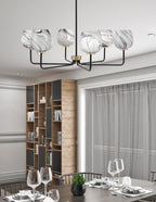 Sandia Six Light Chandelier in Matte Black & New Age Brass with Onyx Swirl Shade