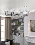 Sandia Eight Light Chandelier in Matte Black & New Age Brass with Clear Ribbed Shade
